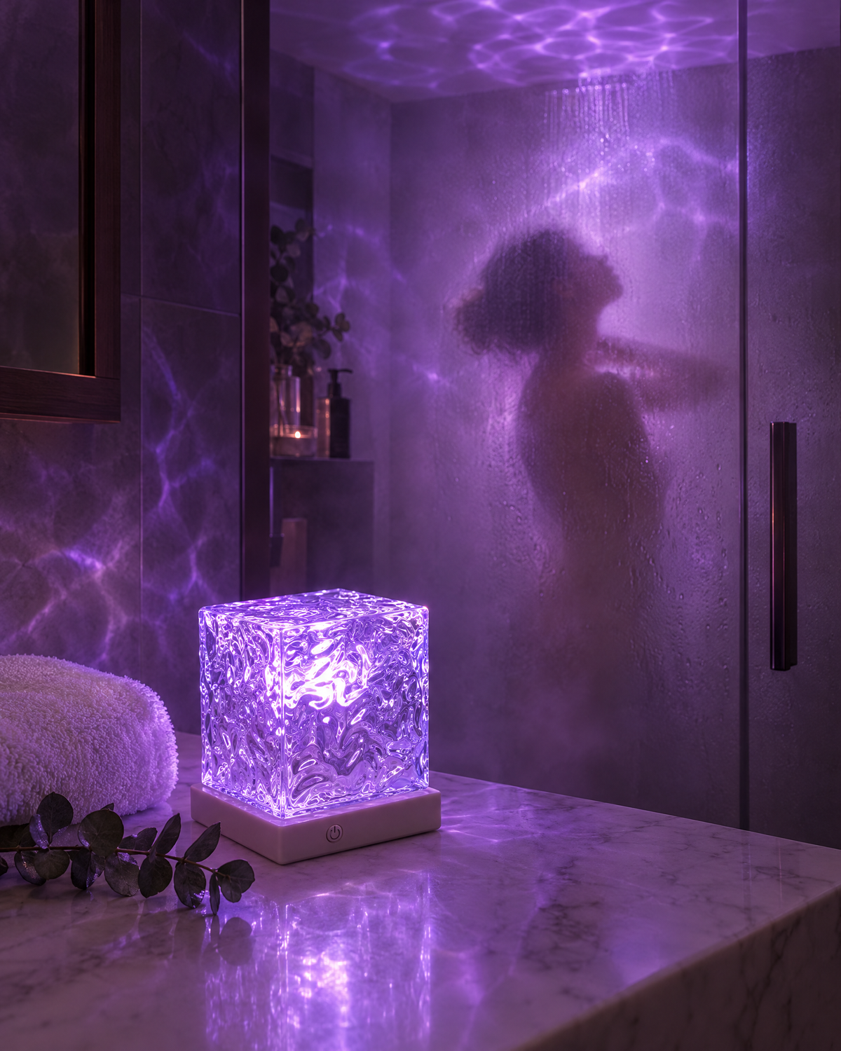 Silhouette behind frosted shower glass in purple ripple light