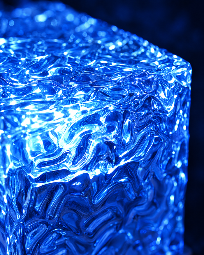 Close-up of the deep wavy ripple texture in the acrylic cube